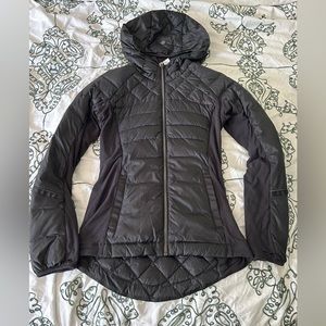 Lululemon Size 4 insulated black running jacket.